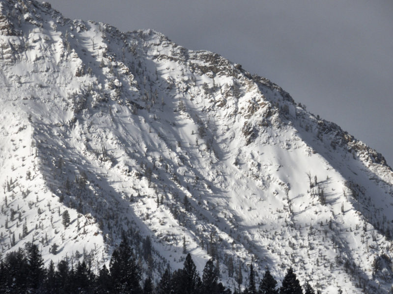 This large natural avalanche released at the end of the recent storm cycle in the Sawtooth mountains north of Williams peak. Crowns are visible spanning the width of this photo.  