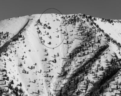 The area in the circle avalanched sometime between yesterday afternoon and 2pm today. Probably a very thin slab, 4-6", failed on a thin layer of facets on a hard alpine surface