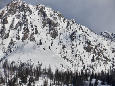 This avalanche on Cabin Creek Peak, northeast of Stanley, appears to have failed sometime during the previous round of storms (2/5-2/8). It failed on a S-SW facing slope at 9,000'.