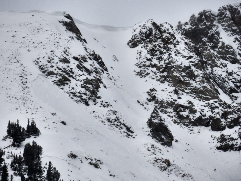 This avalanche failed on an E facing slope at 9,500' after just 6" of snow fell. Visible are several different pockets that failed, the largest is on the left side of the frame. It appears that this heavily wind-loaded portion was able to trigger slides in more sheltered terrain as it traveled downslope.