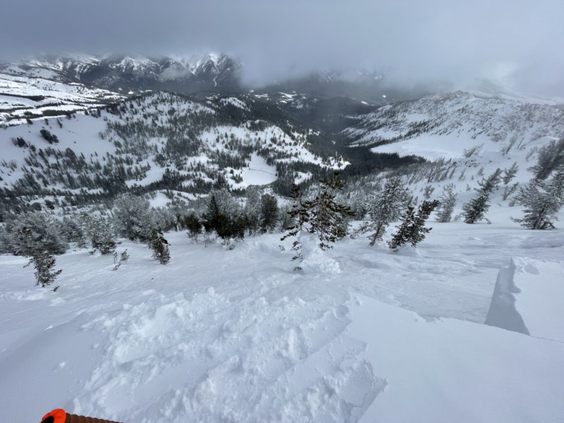 Photo of a large, intentionally-triggered avalanche above Titus Lake. The avalanche initiated as a hard wind slab (formed during last week's wind) and then stepped down into the December facet layer. The slide broke approx. 200' wide and ran 800' vertically. 9700', NE. Chris Marshall photo.