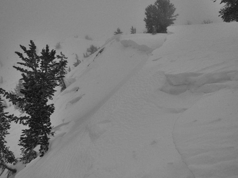 This avalanche was intentionally triggered by a skier stomping on the cornices/wind slab above. It failed on an E/NE facing slope at 9,700' above Titus Lake. The slide initiated in the stiff wind slabs that formed during last week's wind event and then stepped down to the weak snow near the ground as it traveled downslope.
