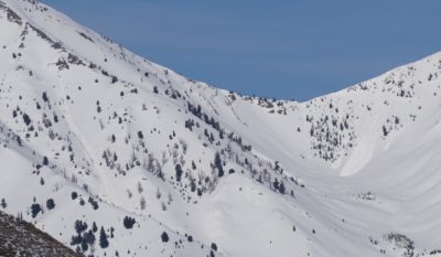 Multiple wet loose avalanches released naturally near the head of the Eagle Ck drainage. 