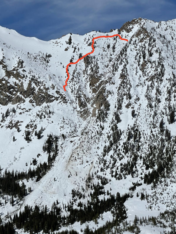 Crown and debris from a large, wet slab avalanche that likely failed during the warm-up at the beginning of March. The crown of the slide is at around 9,600' on a S-facing slope and the slide ran all the way to the valley bottom. 