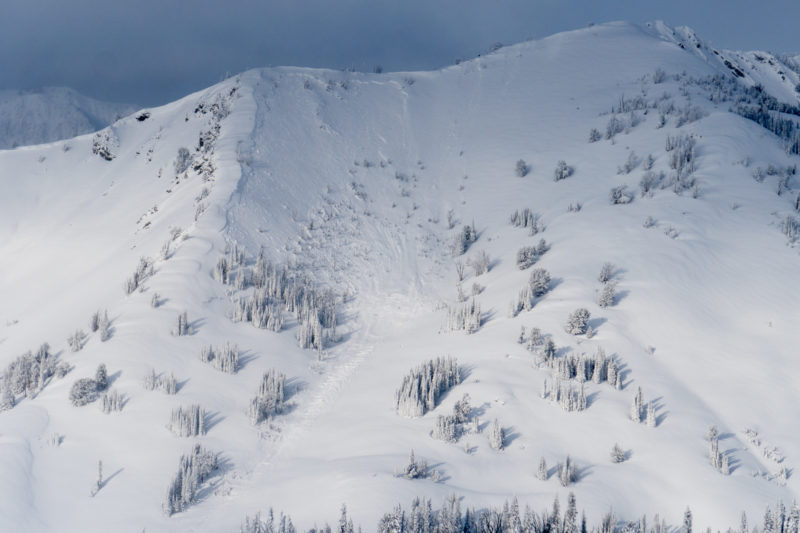 This very large avalanche released on a NE-facing slope at 9,400' in the western Smokys. It occured sometime near the end of the storm around Christmas Day. Photo: Sun Valley Heli Ski