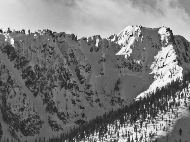 Avalanche in the northern Sawtooths that released near the end of the storm. It looks to have involved the storm snow, and the slope was likely loaded by wind and spindrift spilling down cliffs.