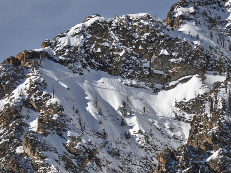 This very large avalanche was triggered by the failure of a massive cornice from above. The crown looks quite deep in places, this may have failed on October snow buried at the base of the snowpack. 