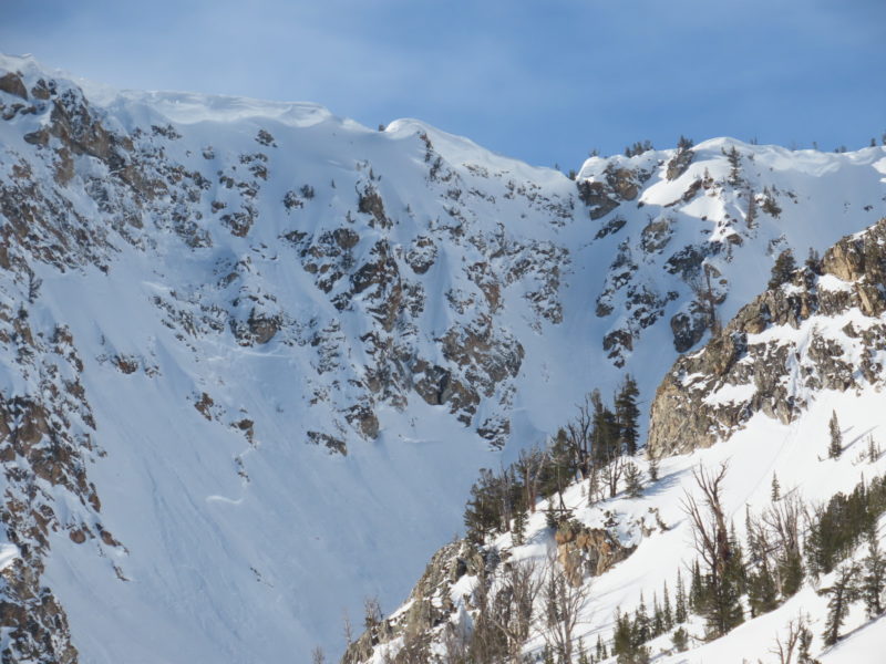 This large avalanche was triggered by the failure of a massive cornice from above. The crown looks quite deep in places, this may have failed on October snow buried at the base of the snowpack. 