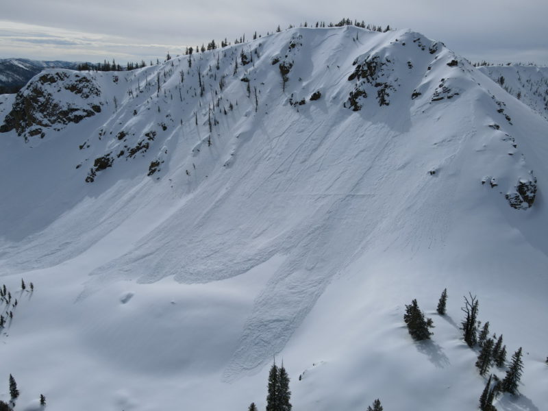 These large slab avalanches failed near Bull Trout Point in the Banner Summit Zone. These slightly discontinuous crowns span over 1,000' of terrain in this photo, with another 500' of crowns out of frame to the left. The crowns pictured here are on a NE/E-facing slope around 8,400-8,700'. 