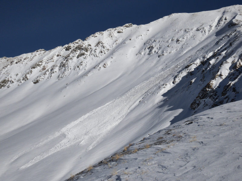 This large, natural avalanche failed on a NW-facing slope at 10,400' on Galena Peak, likely sometime on Thursday morning. It occurred in a heavily wind-loaded location and appears to have failed on the remnant snow left behind from storms in late October (note how dark and dirty the bed surface looks). The crown is an estimated several hundred feet wide.