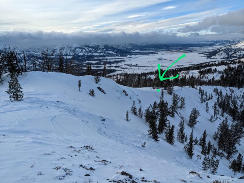 This avalanche was remotely triggered on Saturday evening on Titus Ridge. It failed on a NE-facing slope at around 9,800' and was remotely triggered from around 200' away. The green arrow indicates where the slope was triggered from. The culprit weak layer was snow that fell in October and early November and subsequently faceted.