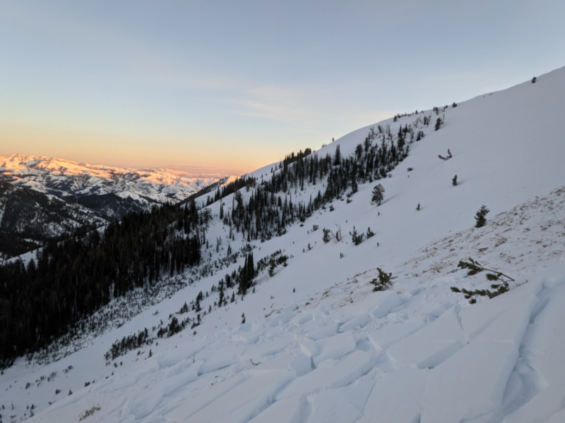 This avalanche was remotely triggered from the ridgeline above. It failed on weak snow near the ground in an area with a thin, wind-affected snow pack. 