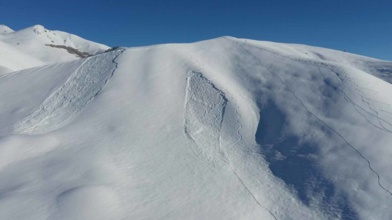 (12/13/2022) Avalanches occurred on NW and W-facing slopes near 6,600' above Fairway Rd in Sun Valley. The avalanche on the right released naturally and was not caused by the skier—they simply skied down to look at the crown. At that time, per their report, the avalanche on the left was not present. It's not clear whether the avalanche on the left was triggered remotely (by another party) or occured naturally.  Photo: S. Cordovano