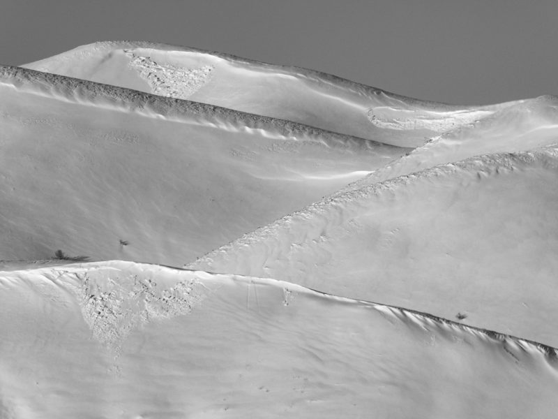 Small, low elevation wind slab avalanches on E aspects near Soldier Ck. 