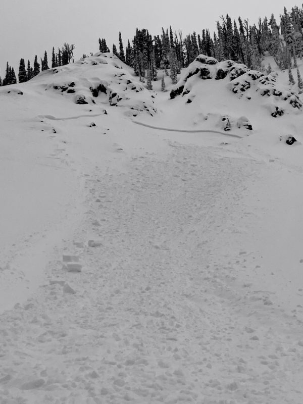 Possible remote triggered avalanche by adjacent ski party. Avalanche debris was deep enough to bury a person. 