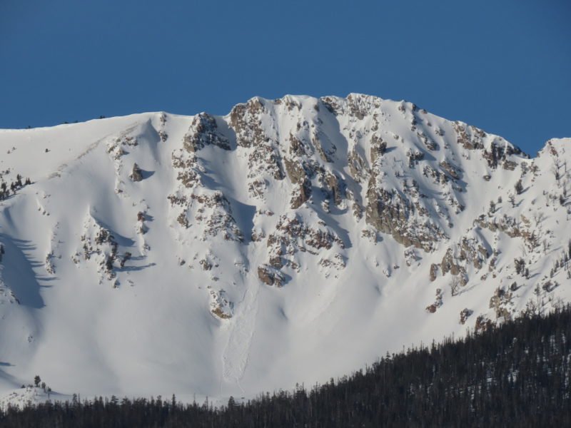 This avalanche failed on an E-facing slope on McDonald Peak in the Sawtooths. It appears to be triggered by a large collapsing cornice that entrained a significant amount of new snow and appears to have flanked out a weak layer 1-2 feet deep.