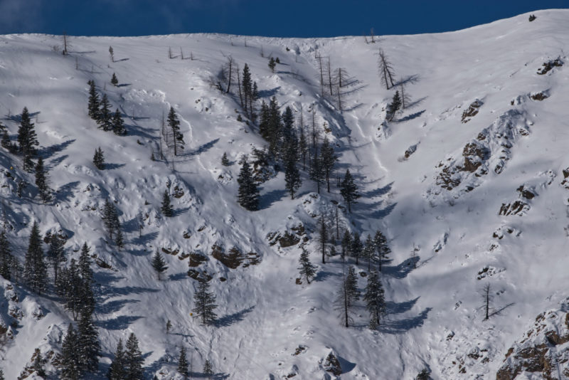 (3/5/23) Wind slabs releasing on a east face around 6500'.