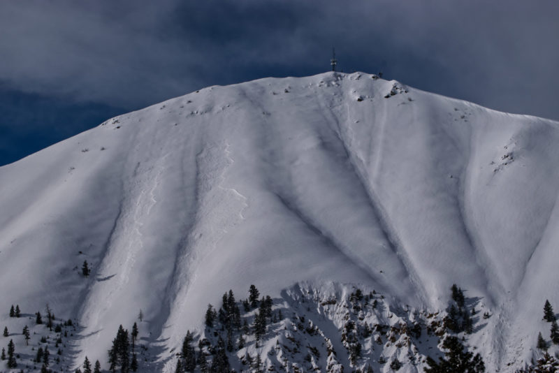 (3/6/23) Numerous wind-driven avalanches on the east face of Della Mtn between 6000-6800'. 