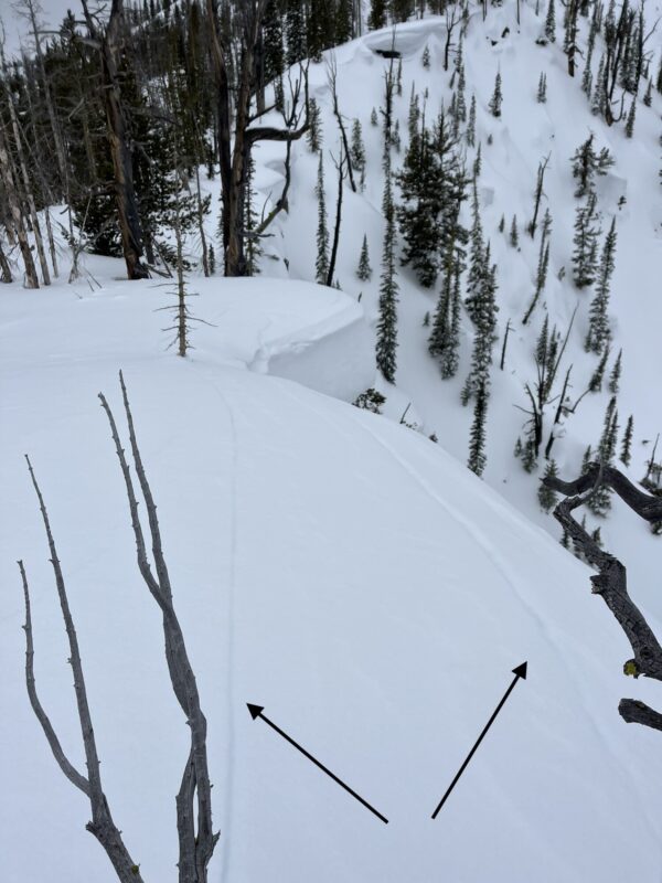 (3/12/23) Cracks from a cornice beginning to calve from the ridgeline.