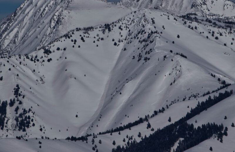 (3/11/23) One very large avalanche occurring earlier in the storm on in the west bowl of Johnstone Peak. Two other lager avalanches are visible on similar slopes. 