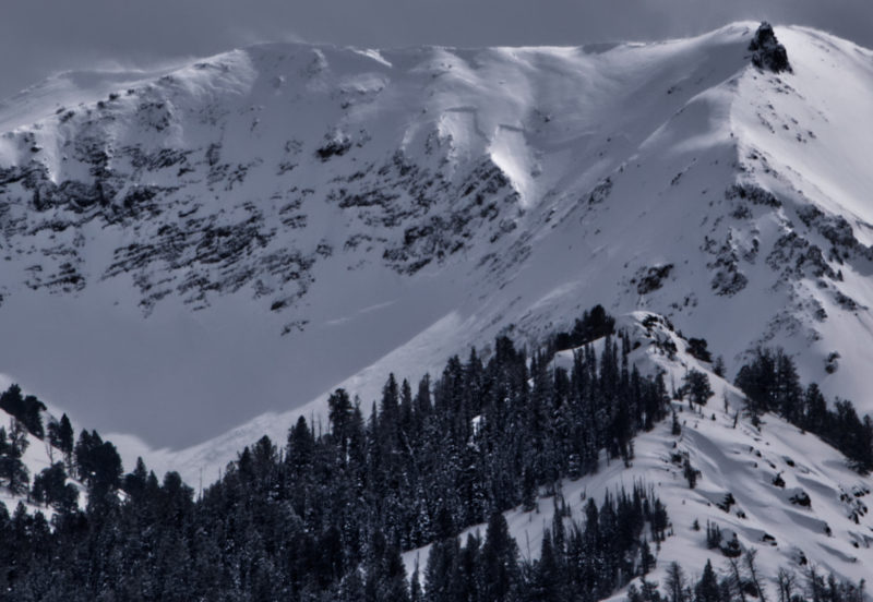 (3/5/23) A heavily wind-loaded area in a steep, north facing alpine bowl at 10,000'. This large avalanche wrapped around many terrain features.