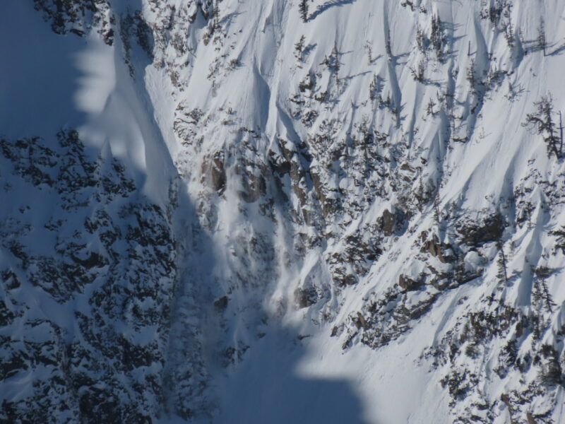 This loose snow avalanche released naturally under the sun's influence in the Sawtooths. Though small, slides like this can knock you off your feet and carry you through ugly terrain. 